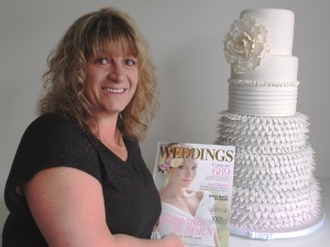Wedding masterpiece: Alison Lythgow, owner of Cake Alicious in Bell Block, returned from Fashion Week after being named as runner-up for the North Island in the cake decorating section. Photo: Sharyn Smart 