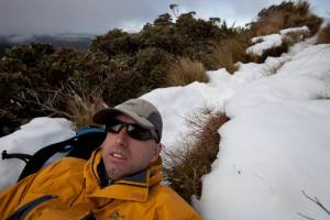 Cold wait: Guy Vickers waits for the Taranaki Rescue Helicopter to rescue him off Mt Taranaki